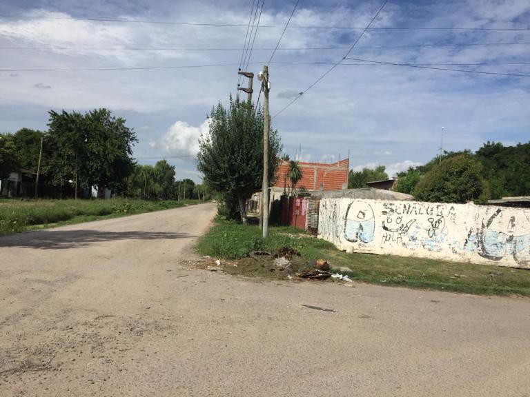 Terreno con mejoras