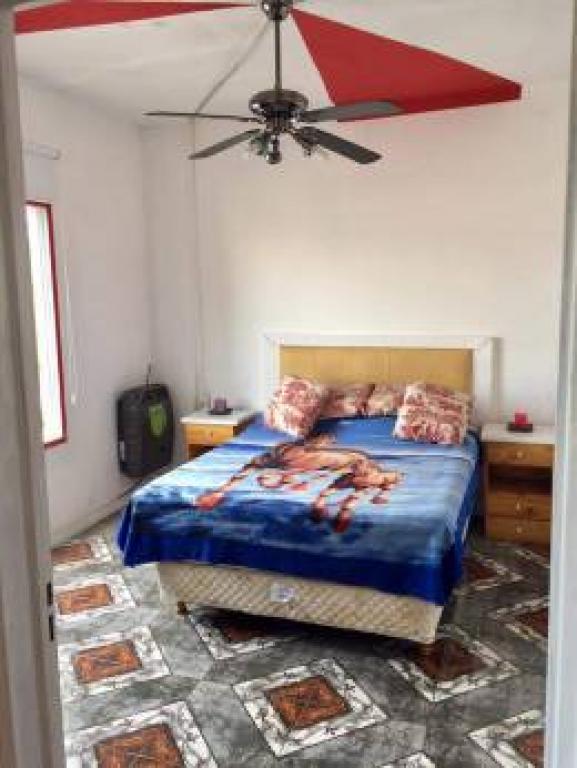 EXCELENTE TERRENO CON CONSTRUCCIÓN