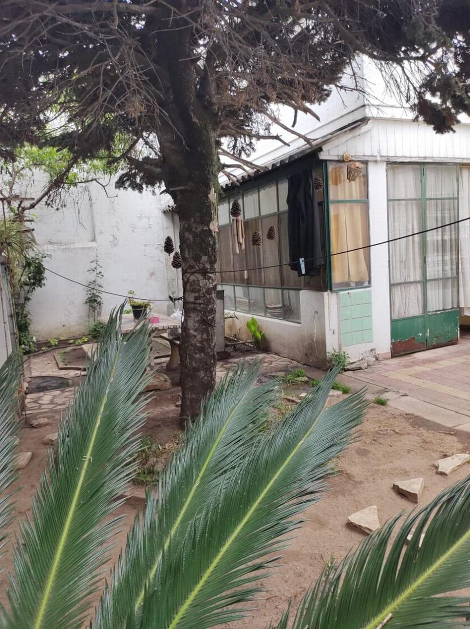 CASA 4 AMB CON FONDO Y TERRAZA CON DEPTO A TERMINAR