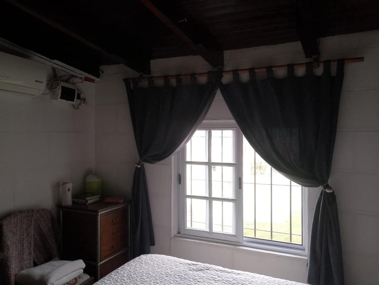 Casa en barrio en crecimiento