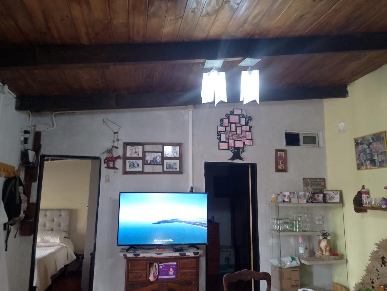 Casa en barrio en crecimiento