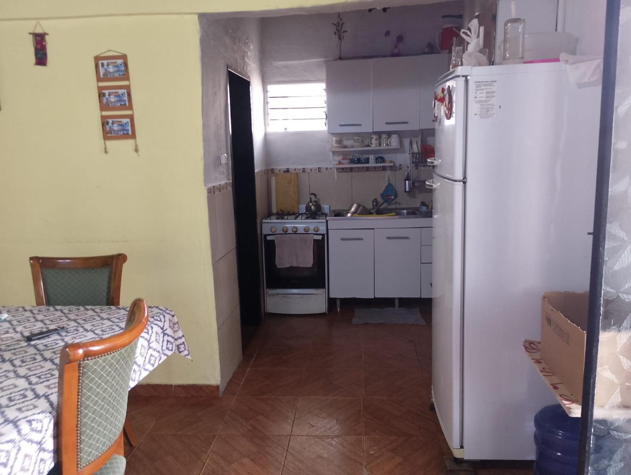 Casa en barrio en crecimiento