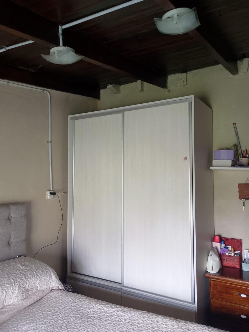 Casa en barrio en crecimiento