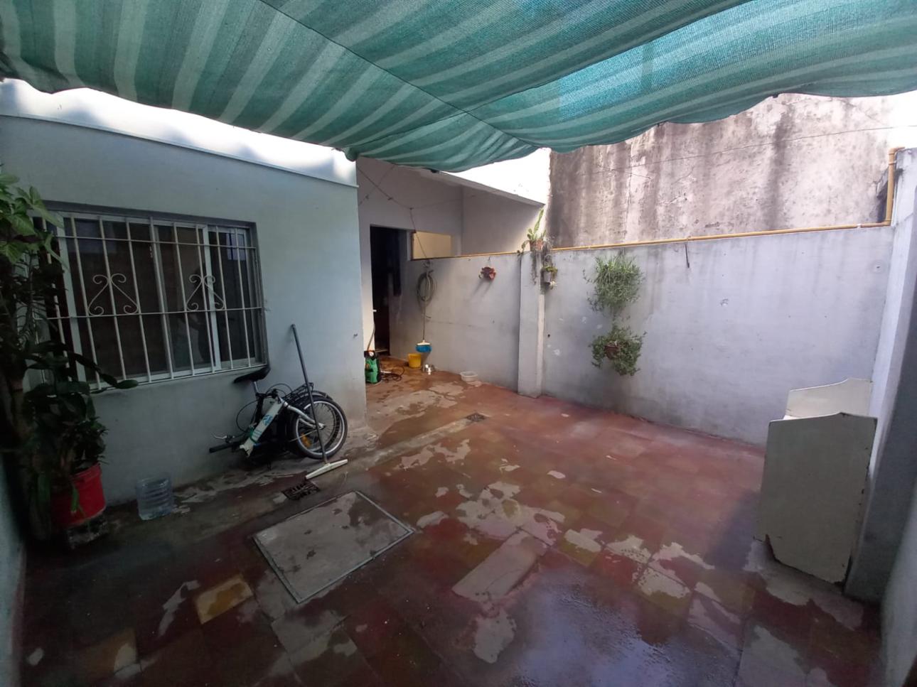 TIPO CASA AL FRENTE, COCHERA, FONDO LIBRE, PATIO