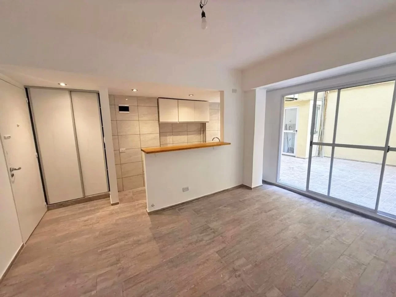 DEPARTAMENTO EN PLANTA BAJA CON PATIO PRIVADO