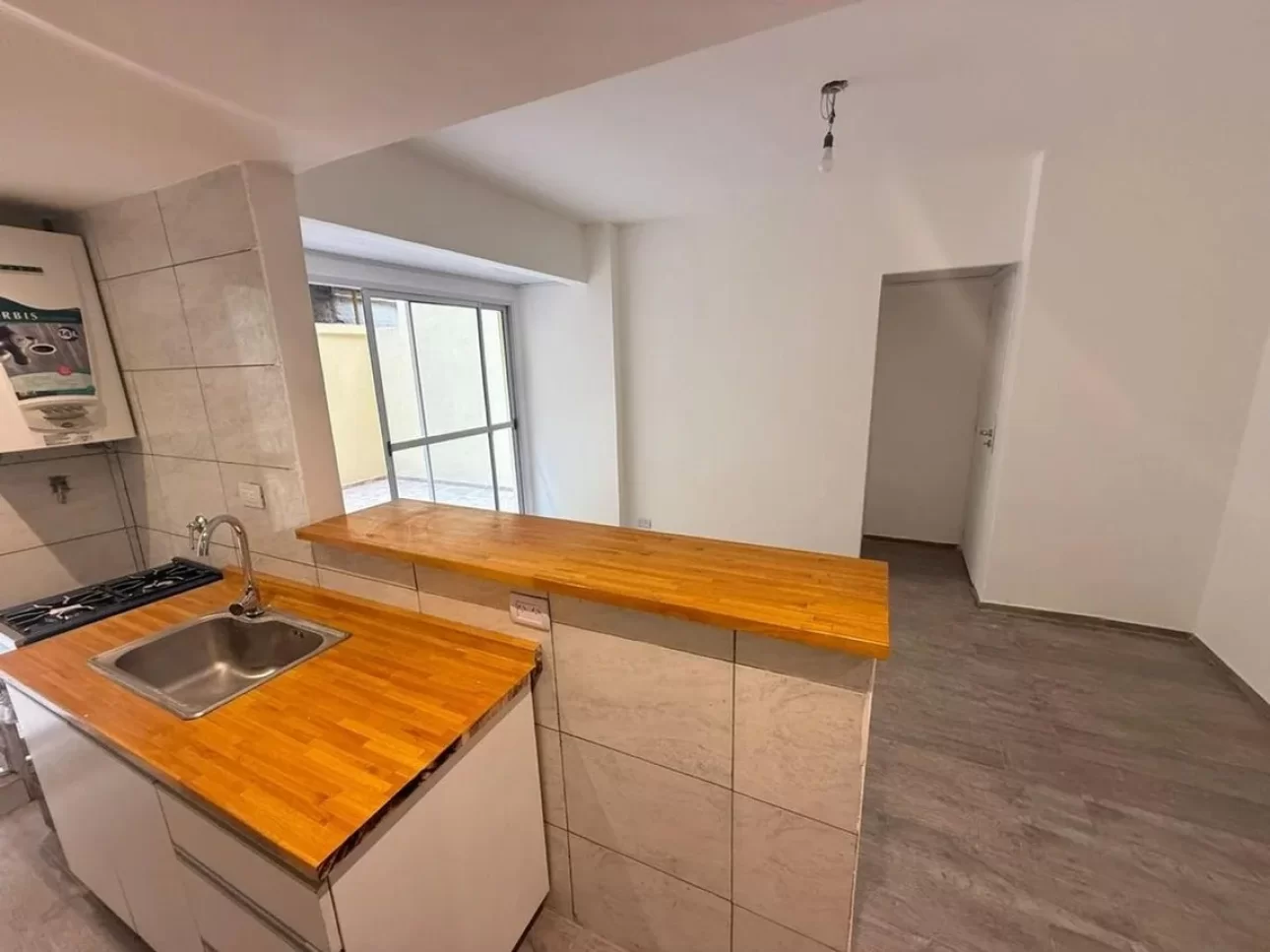 DEPARTAMENTO EN PLANTA BAJA CON PATIO PRIVADO
