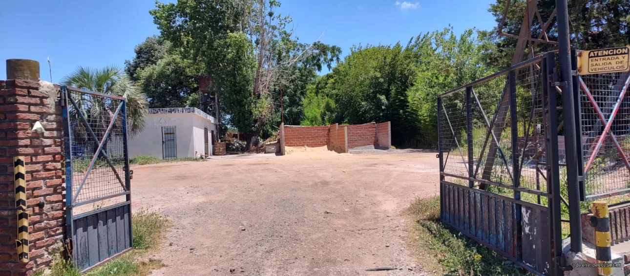 Campo de 2.4Has con 600m2 de galpones sobre Panamericana