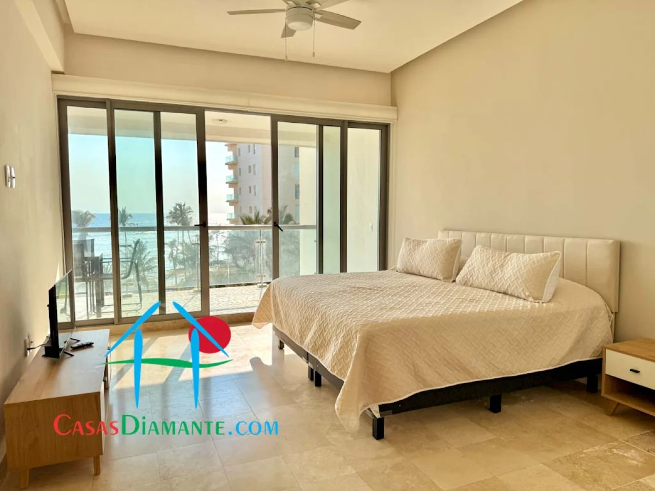 Departamento de playa con terraza y vista al mar
